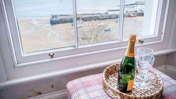 32-inch TV with cable channels, fireplace