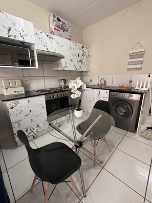 Apartment | Private kitchen | Fridge, microwave, oven, stovetop
