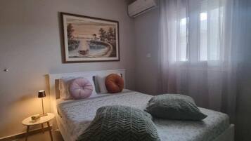 1 chambre, fer et planche à repasser, Wi-Fi, literie fournie