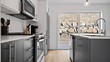 Townhome | Private kitchen | Coffee/tea maker