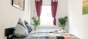 Entspannung Pur: Stadtnahe Ferienwohnung mit Grünem Rückzugsort im Garten