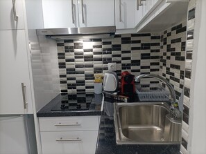 Microondas, placa de cocina