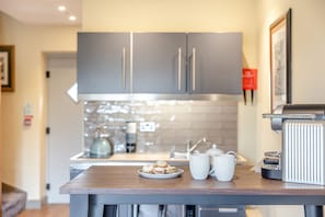 Fridge, oven, cookware/dishes/utensils