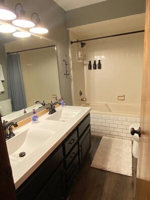 Hair dryer, towels, soap, toilet paper