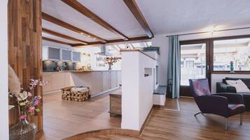 Deluxe Apartment, Mountain View | Living area | 50-inch Smart TV with cable channels