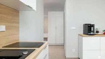 Fridge, microwave, stovetop, coffee/tea maker