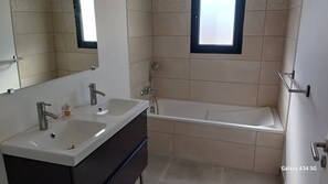 Shower, towels, toilet paper