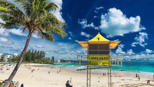 A lifeguard tower on a beach with clear skies and turquoise water. - Freedom Beach Homes Unit 199B Brand New in Rainbow Bay with private plunge pool and Wi-Fi Inc. (Coolangatta)