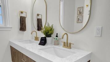 Hair dryer, towels, soap, shampoo