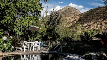 Seasonal outdoor pool, pool umbrellas, sun loungers