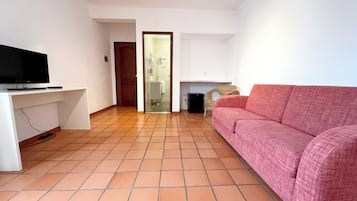 Suite | Living area | 50-inch flat-screen TV with cable channels