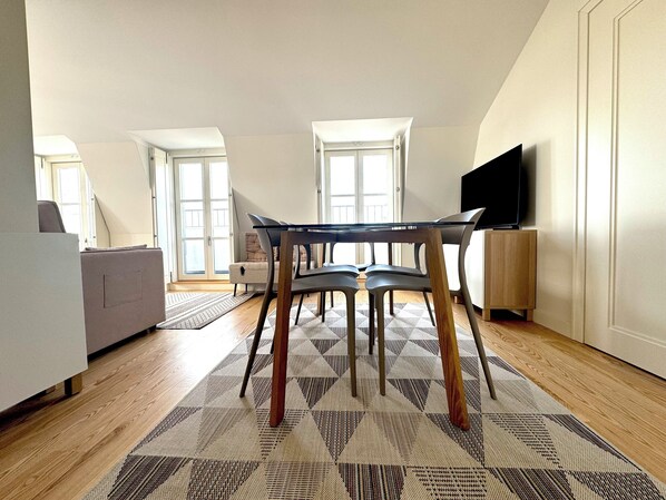 Deluxe Apartment, River View | Living area | 47-cm Smart TV with cable channels, Netflix, streaming services