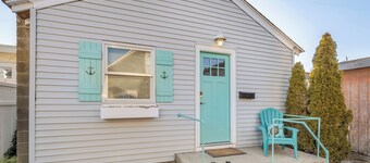 Walk to the beach or Sunset Lake with a front yard and Pet-Friendly!