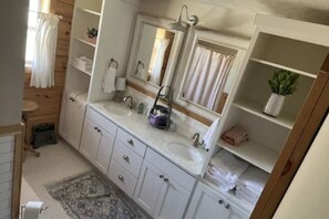 Hair dryer, towels, soap, toilet paper