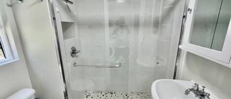 Shower, hair dryer, towels, soap