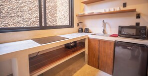 Private kitchen | Mini-fridge, dining tables - Nuée Hotel & Beach Club (Tulum)