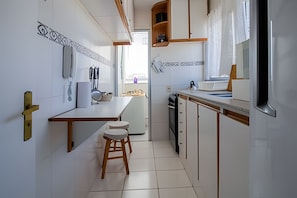 Apartment | Private kitchen | Fridge, microwave, oven, electric kettle