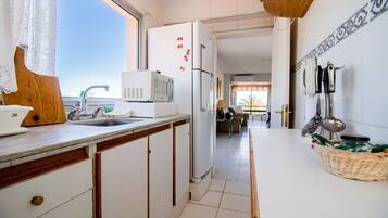 Apartment | Private kitchen | Fridge, microwave, oven, electric kettle
