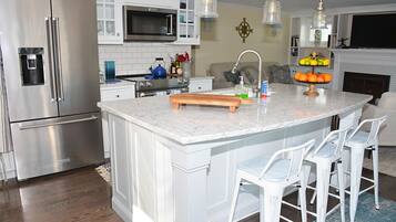 Luxury Condo | Private kitchen | Full-sized fridge, microwave, oven, stovetop