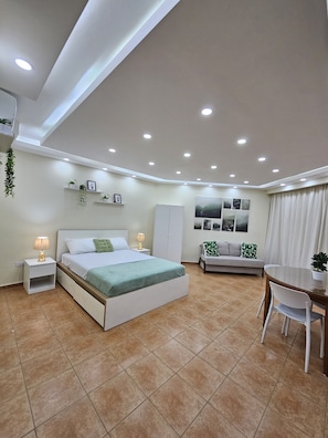 1 soverom, strykejern/-brett, reiseseng for barn og wi-fi