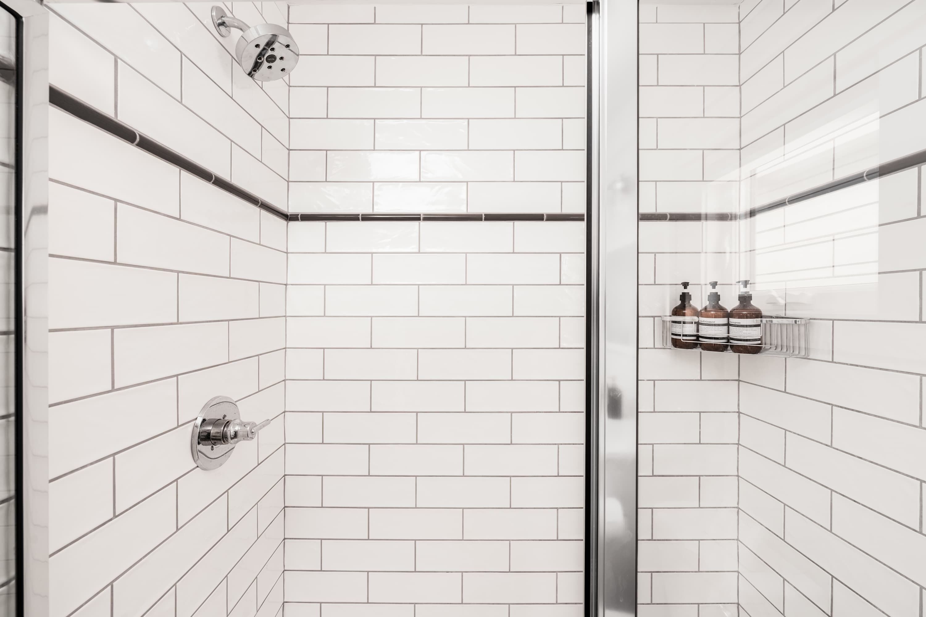Shower, hair dryer, towels, shampoo