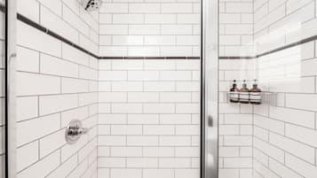 Shower, hair dryer, towels, shampoo