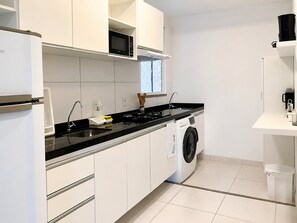 Comfort Apartment | Private kitchen | Fridge, microwave, stovetop, coffee/tea maker
