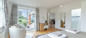 A wonderful single level property set within a working equestrian setting.