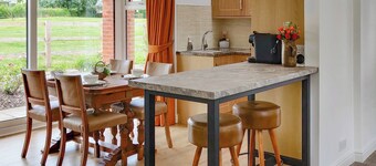 A wonderful single level property set within a working equestrian setting.