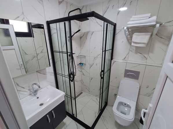 Jetted bath, hair dryer, towels, soap