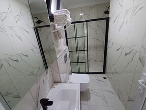 Jetted bath, hair dryer, towels, soap