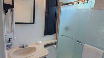 Shower, hair dryer, shampoo