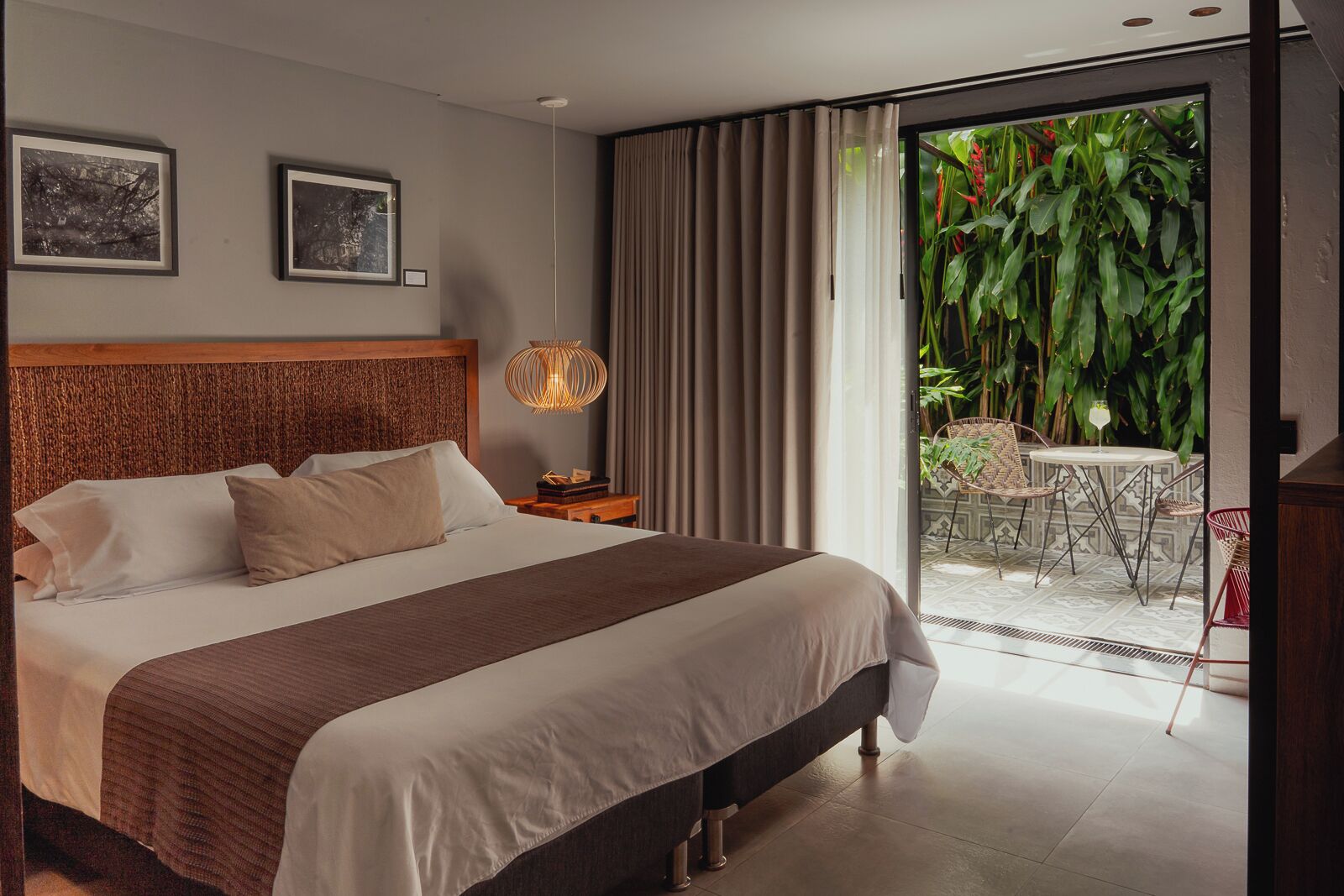 Design Suite, 1 King Bed, Patio | Minibar, in-room safe, individually decorated, desk