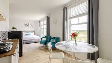 1 chambre, fer et planche Ă repasser, Wi-Fi gratuit, draps fournis