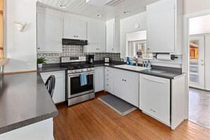 Fridge, microwave, oven, stovetop - 4th Ave Hideaway - Cozy home with spacious yard (Columbia Falls)