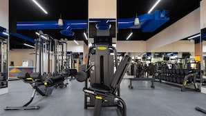 A gym with various exercise machines, benches, and weight stacks. - 2 Bedroom Beach Front Hotel Suite Villa La Valencia (San José del Cabo)