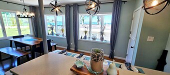 Lakefront cottage on Muskegon Lake! Fire pit, 40' BOAT DOCK, near beach, shops