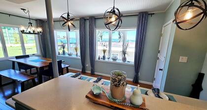 Lakefront cottage on Muskegon Lake! Fire pit, 40' BOAT DOCK, near beach, shops