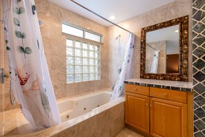 Shower, jetted bath, hair dryer, towels