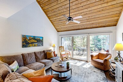 Riverfront condo with lake access, views, deck, washer/dryer, community firepit