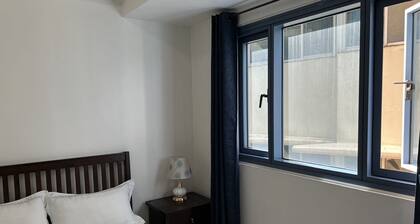 US Embassy Apartments at Bay Sunset