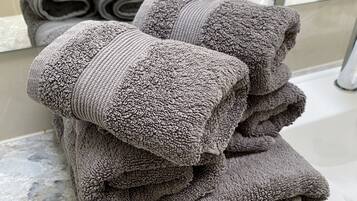 Hair dryer, towels, soap, shampoo
