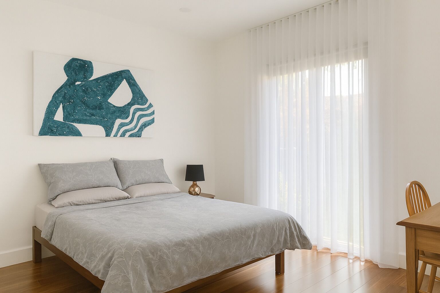 A bedroom with a bed, a nightstand, a lamp, and a painting on the wall.
