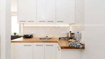 Geladeira, cooktop, torradeira