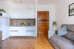 Living area - GuestHost - Bright 35 sqm apartment, perfect for 4 people, located on the third floor of a building with lift (NOT suitable for disabled people). The accommodation is located in a neighborhood served by all the main services: bars, restaurants, supermark (Pisa)