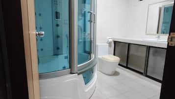 Shower, jetted bath, hair dryer, bidet