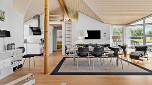 A modern kitchen with white cabinets, a built-in oven, and a large window. - Pet friendly home in Farsø with WiFi (Farsø)