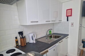 Refrigerador, horno, placa de cocina