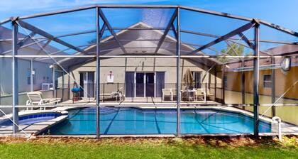 Snowbird-friendly home with private pool, spa, game room, tennis, basketball, AC