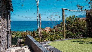A stone building with a view of the ocean. - GuestReady - Magical refuge in Madeira (Seixal)